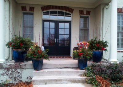 Front porch with winter containers.